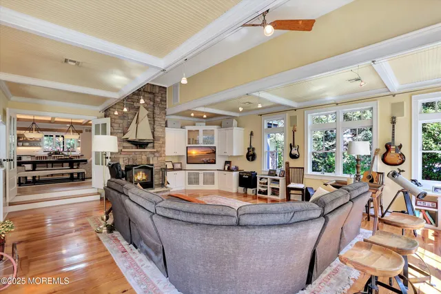 a front view of a house with outdoor seating and plants