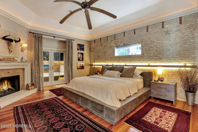 a white toilet sitting next to a window in a bathroom