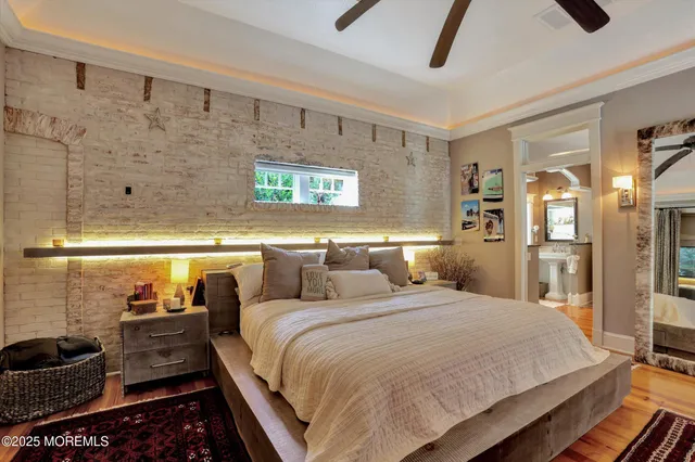 a living room with furniture a refrigerator and a table