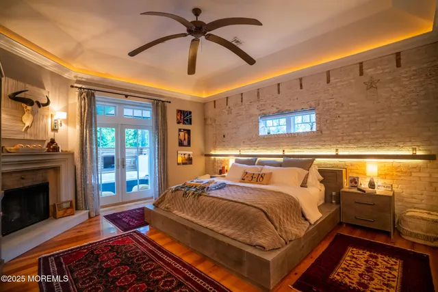 a bedroom with a bed and a desk