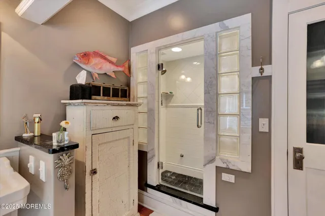 an aerial view of a house with garden space and street view