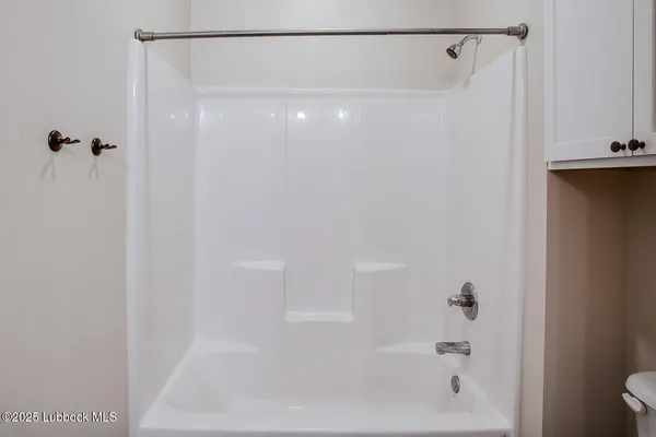 a close view of a bathtub in a bathroom