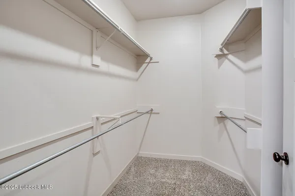 a view of a room with racks on the wall