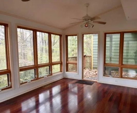 a view of an empty room with a window