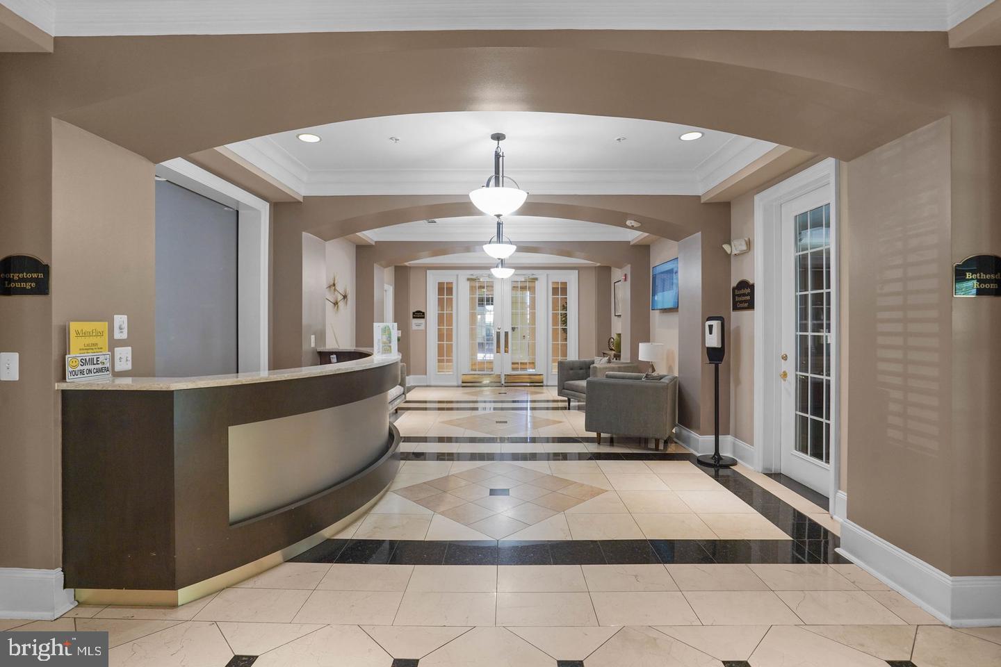 11800 Old Georgetown Road, Unit 1120 North Bethesda, MD 20852 - Photo 24 of 36 a view of lobby with furniture and a chandelier