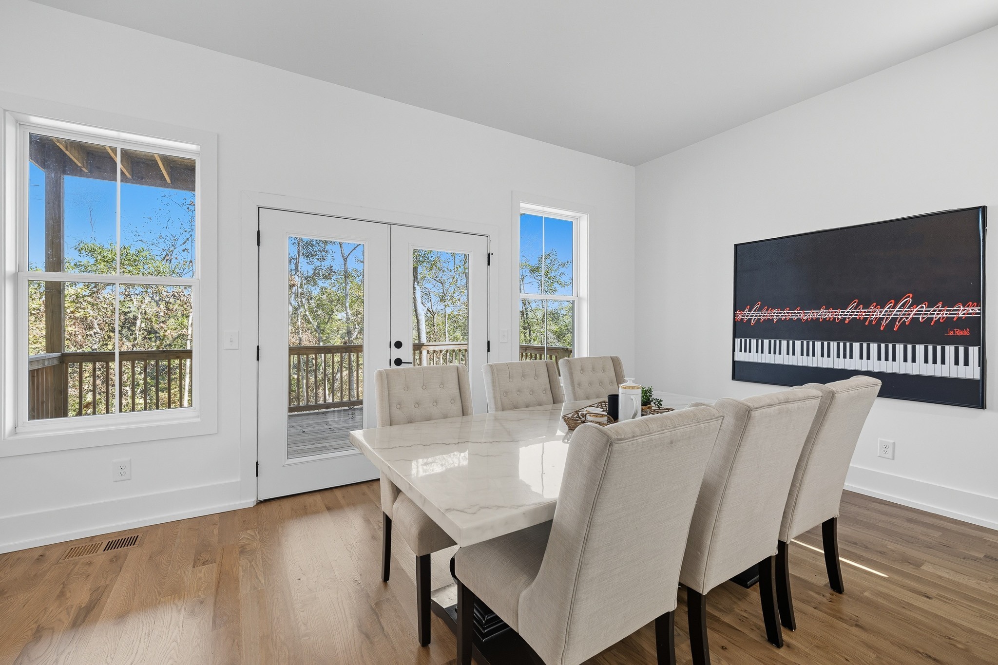 294 Rio Vista Drive Madison, TN 37115 - Photo 15 of 69 a view of a dining room with furniture window and wooden floor