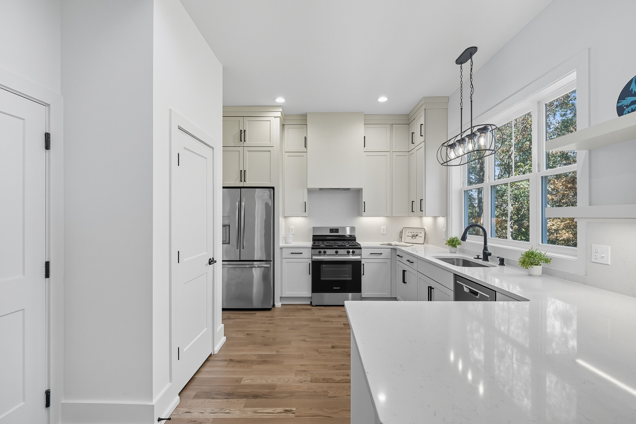 294 Rio Vista Drive Madison, TN 37115 - Photo 16 of 69 a large kitchen with stainless steel appliances kitchen island granite countertop a refrigerator and a sink