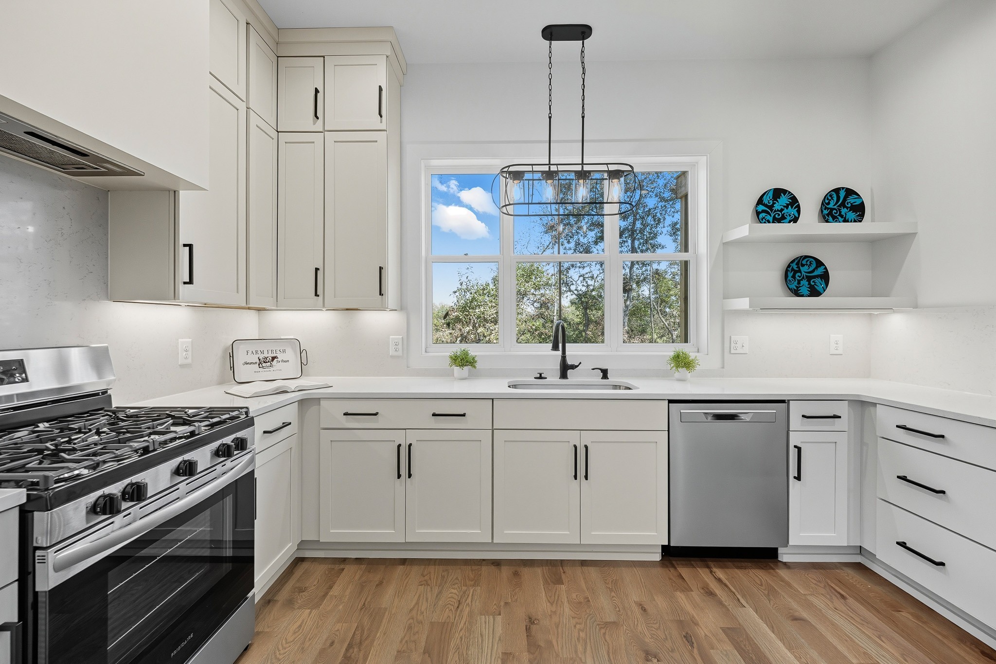 294 Rio Vista Drive Madison, TN 37115 - Photo 18 of 69 a kitchen with granite countertop white cabinets and white appliances