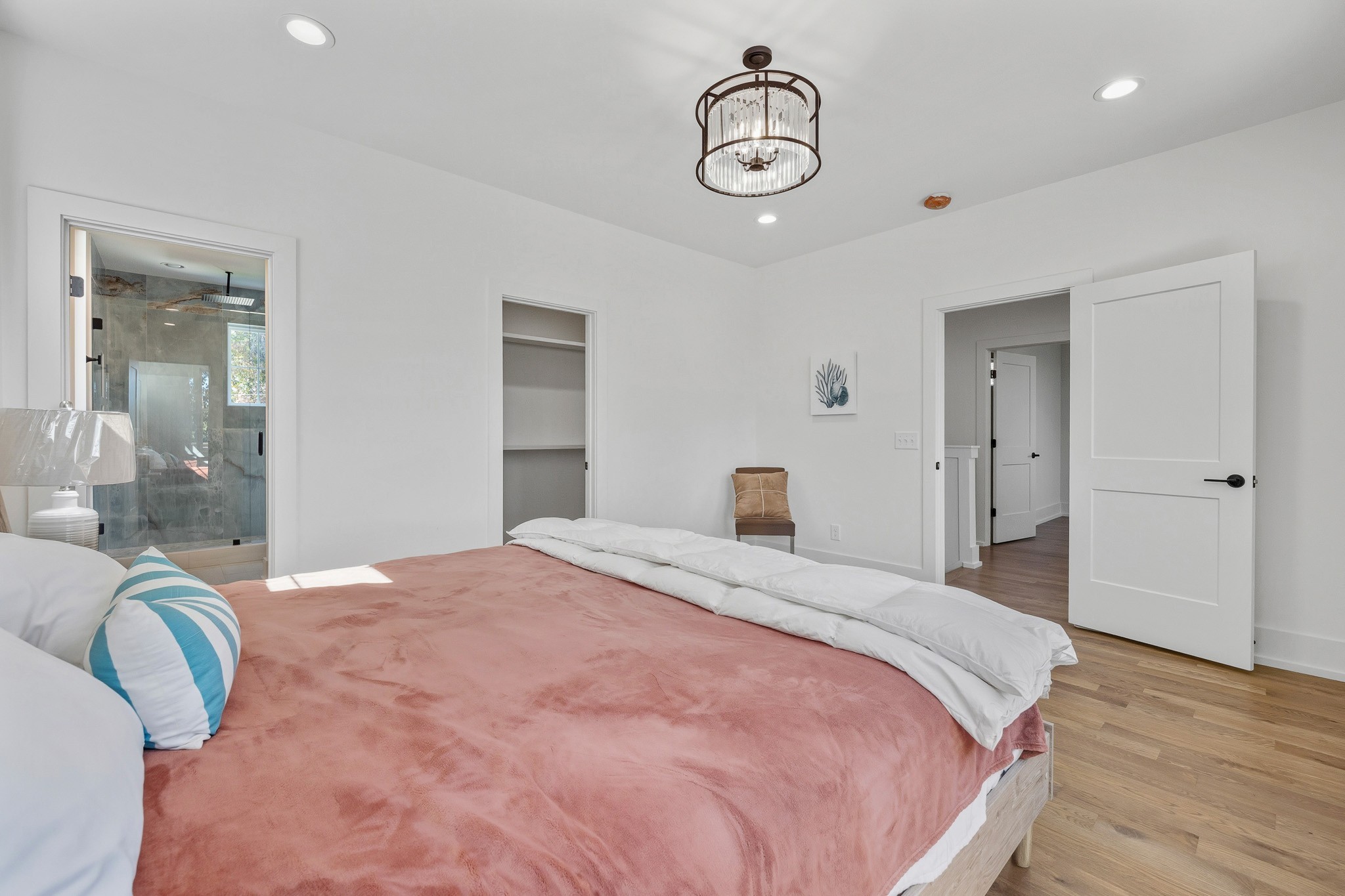 294 Rio Vista Drive Madison, TN 37115 - Photo 27 of 69 a bedroom with a bed and chandelier