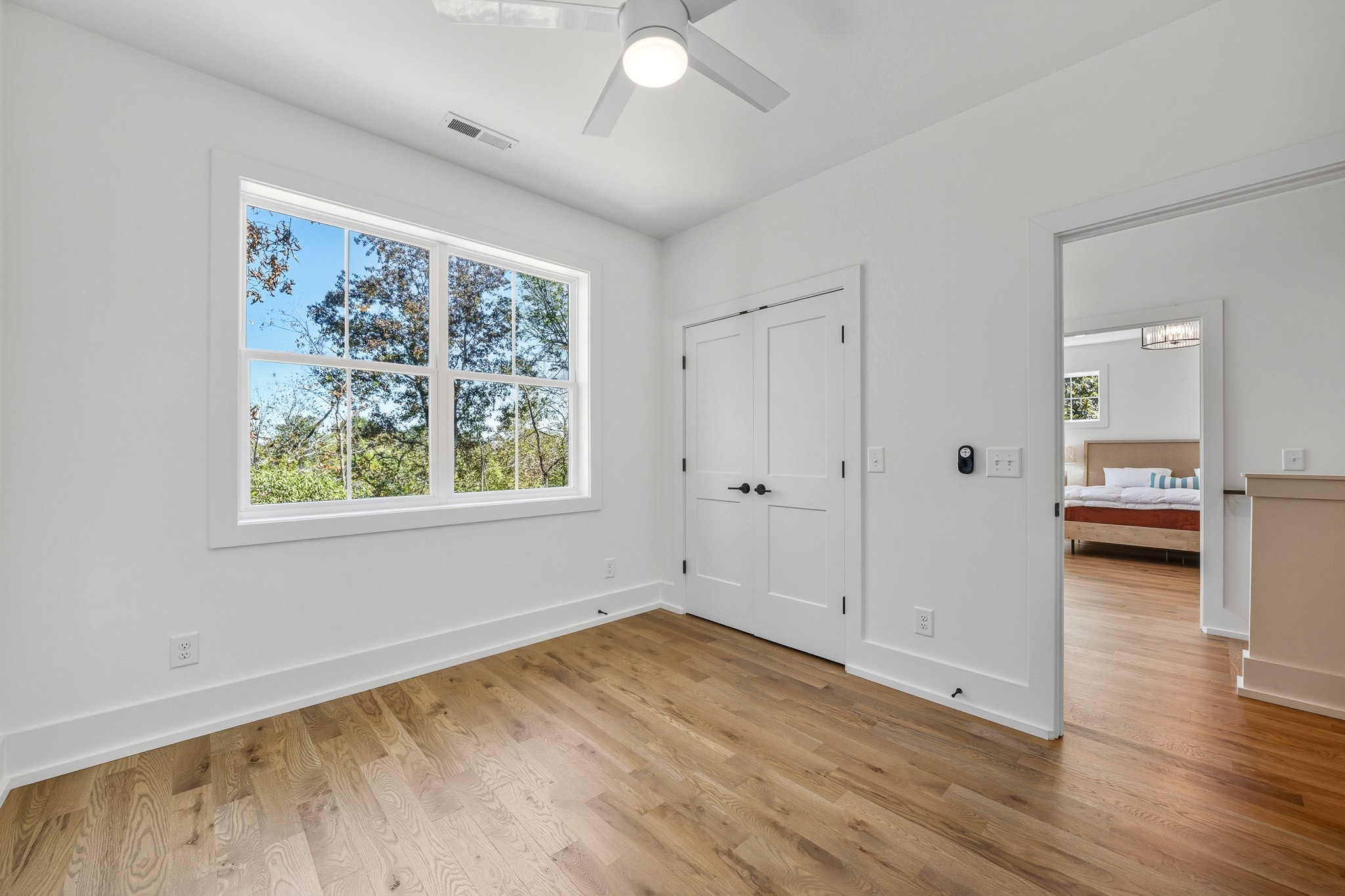 294 Rio Vista Drive Madison, TN 37115 - Photo 40 of 69 wooden floor in an empty room with a window