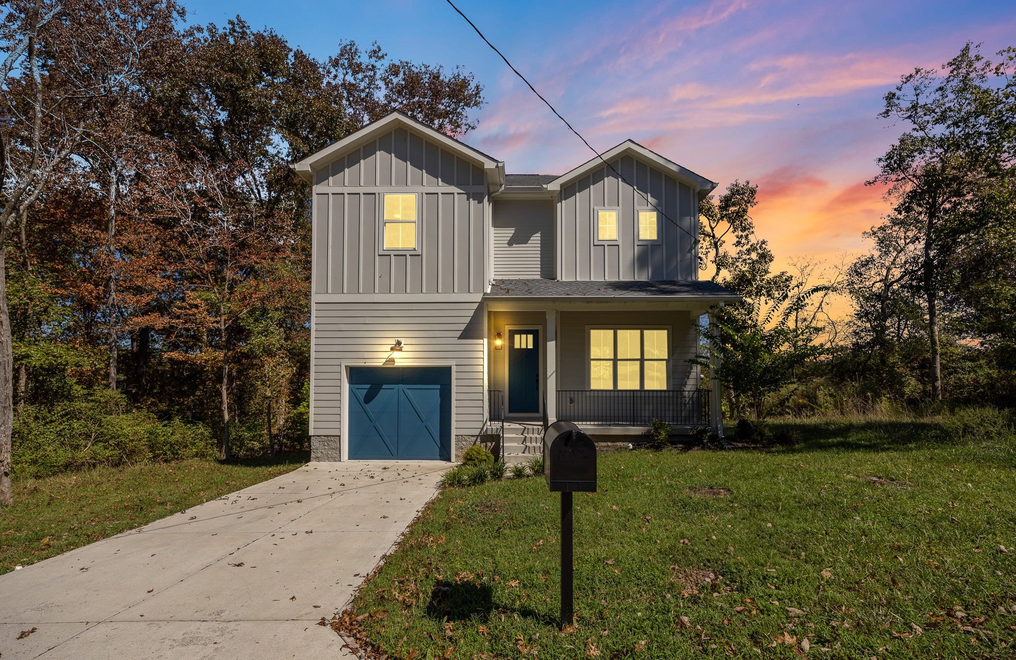 294 Rio Vista Drive Madison, TN 37115 - Photo 4 of 69 a front view of a house with a yard and garage