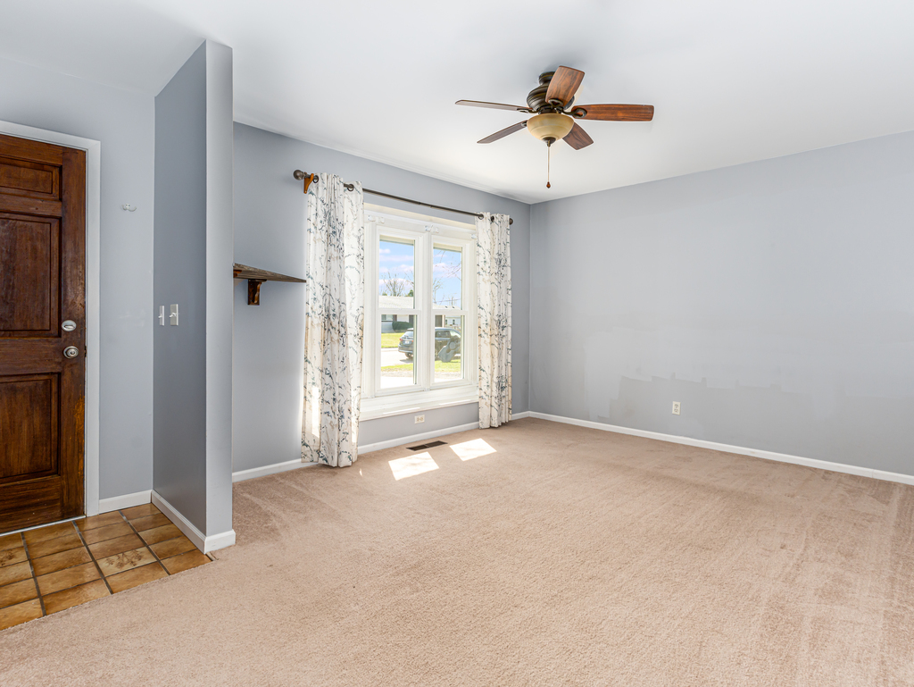 78 Springdale Road Montgomery, IL 60538 - Photo 9 of 21 a view of an empty room with a window