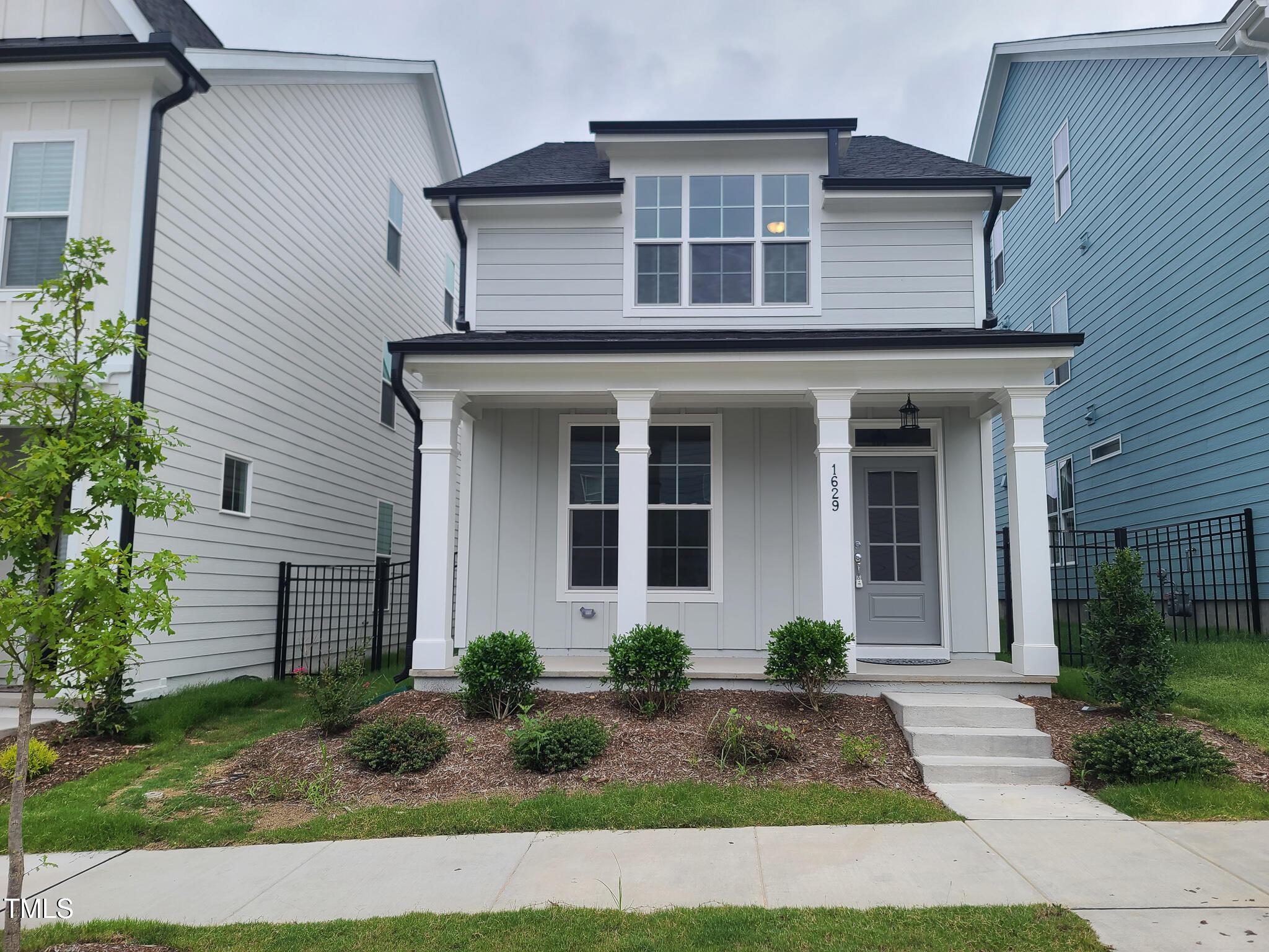1629 Glazebrook Drive Wake Forest, NC 27587 - Photo 1 of 35 front view of a house