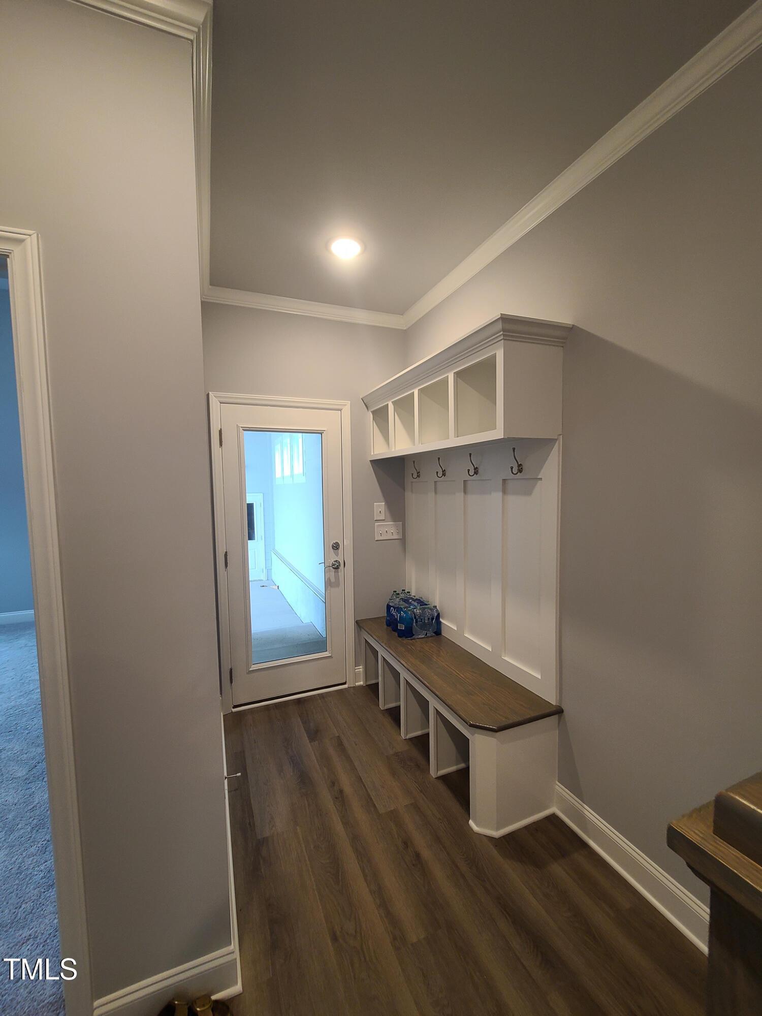 1629 Glazebrook Drive Wake Forest, NC 27587 - Photo 11 of 35 a room with wooden door and furniture