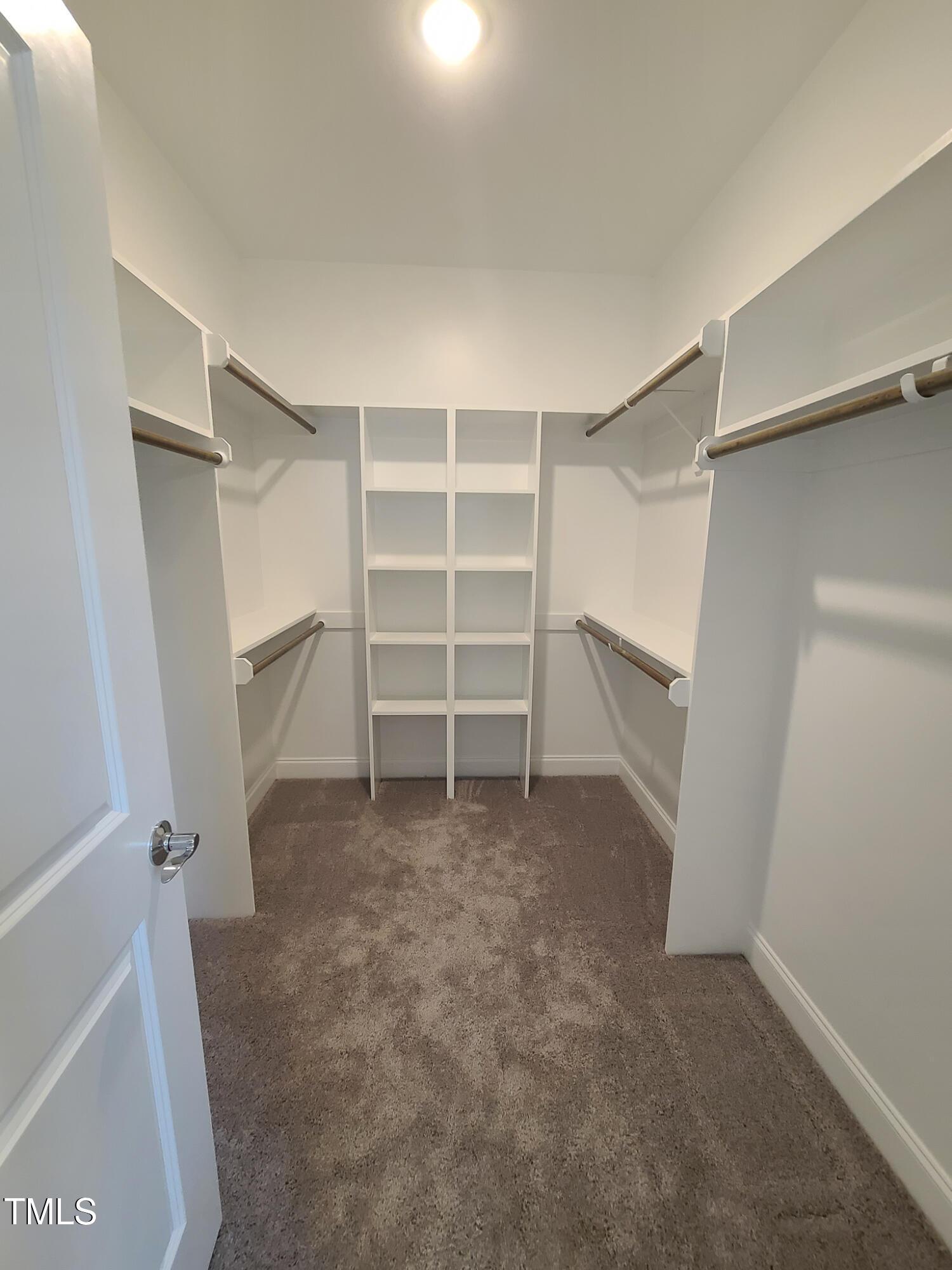 1629 Glazebrook Drive Wake Forest, NC 27587 - Photo 18 of 35 a view of an empty walk in closet