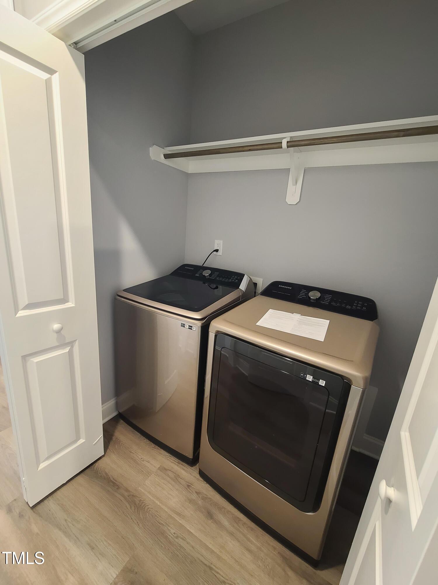 1629 Glazebrook Drive Wake Forest, NC 27587 - Photo 19 of 35 a utility room with dryer and washer