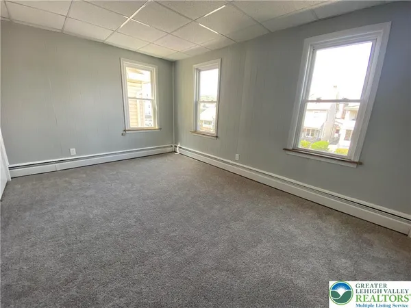 an empty room with windows