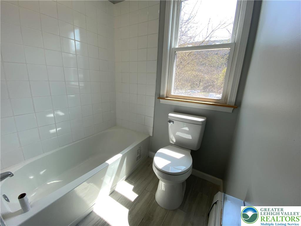 350 Lehigh Avenue Palmerton, PA 18071 - Photo 10 of 18 a bathroom with a toilet and a shower