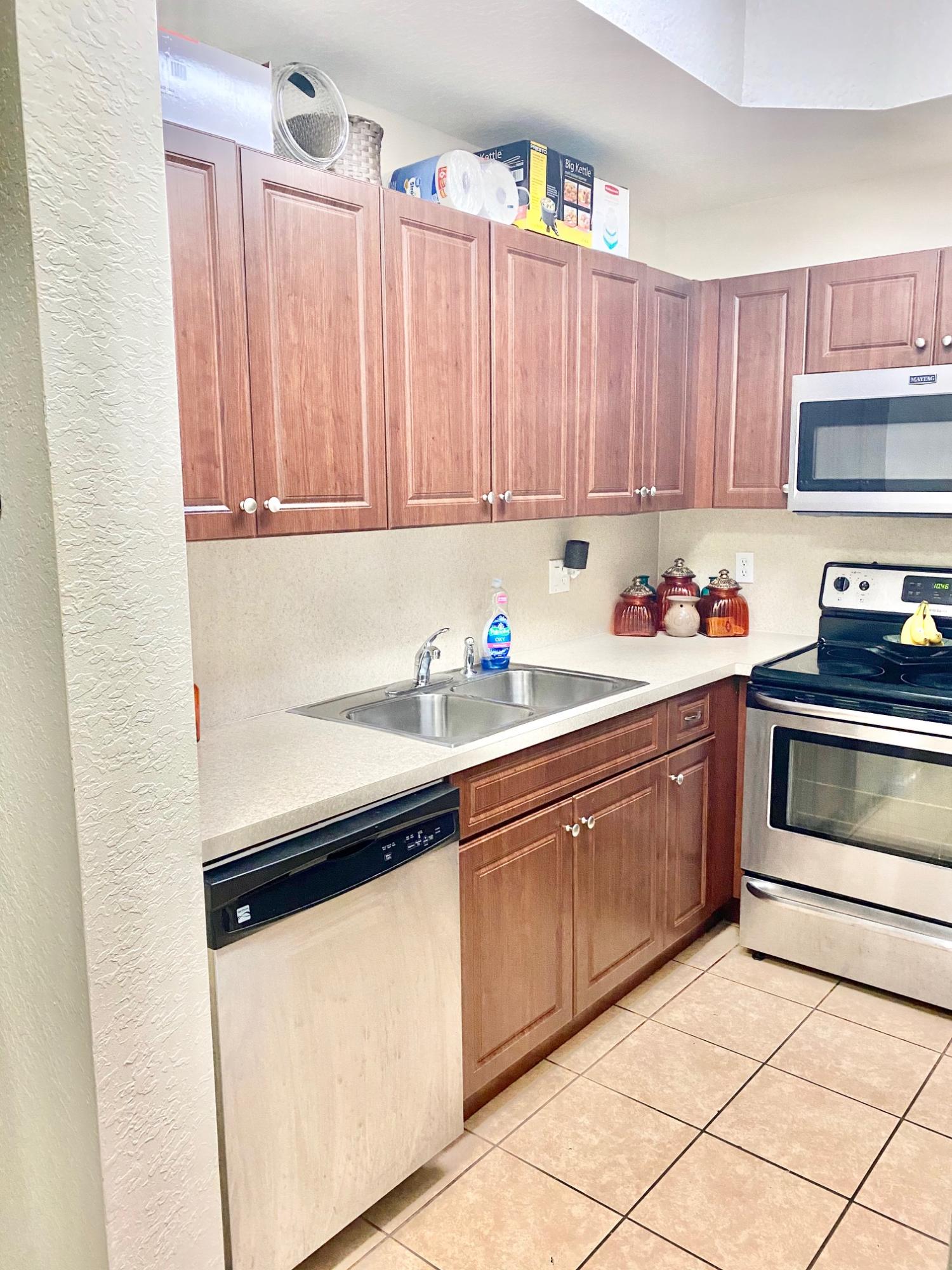 2905 Hidden Hills Road, Unit 2210 West Palm Beach, FL 33411 - Photo 13 of 27 Kitchen 1