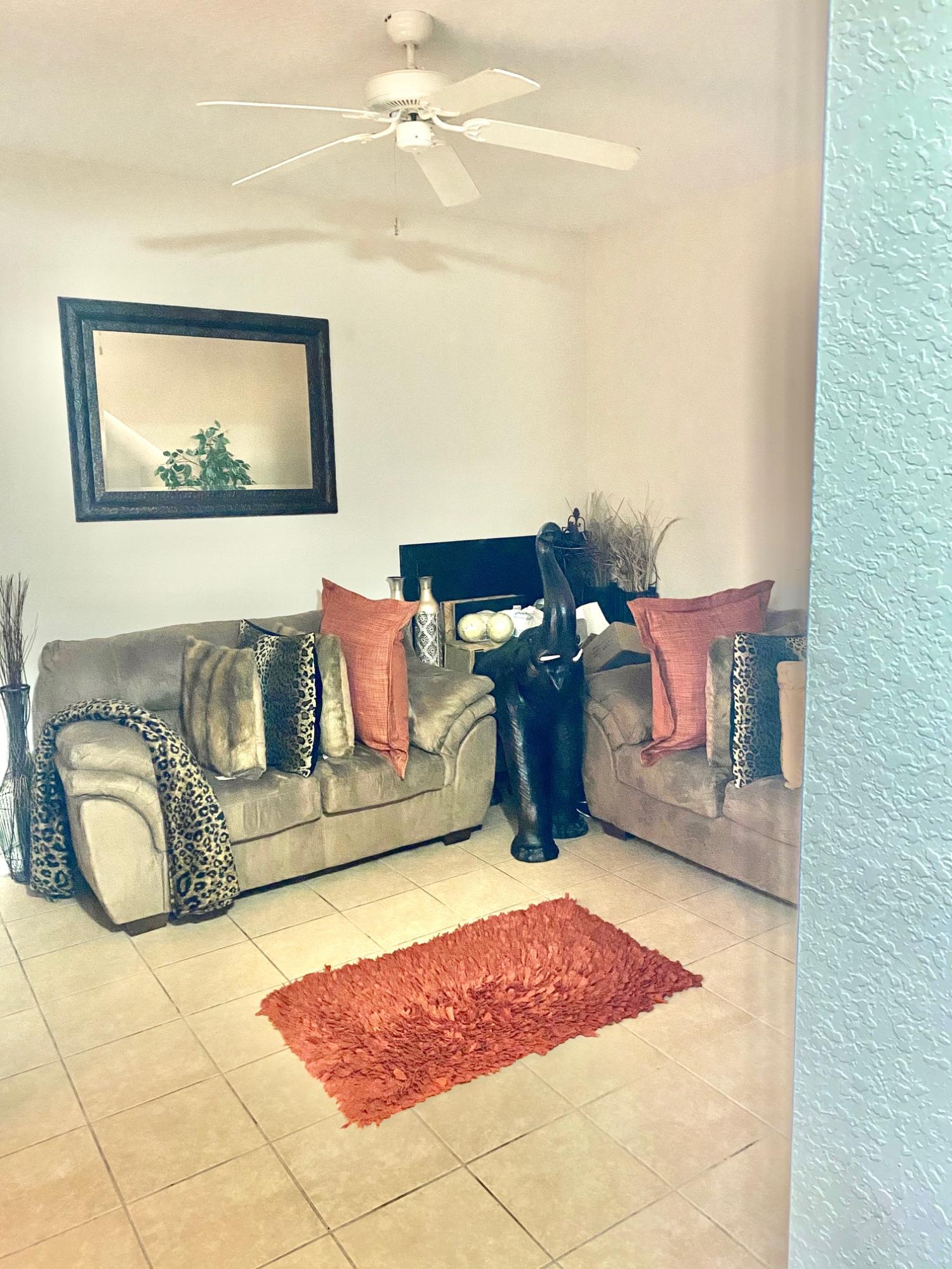 2905 Hidden Hills Road, Unit 2210 West Palm Beach, FL 33411 - Photo 14 of 27 Family room