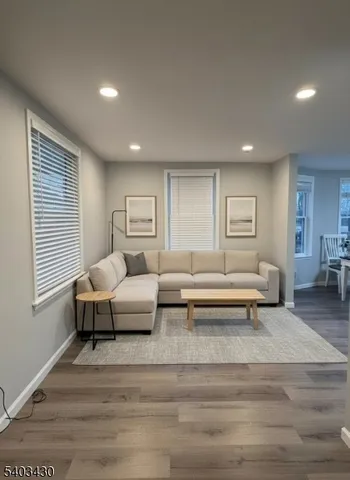a living room with furniture and a couch