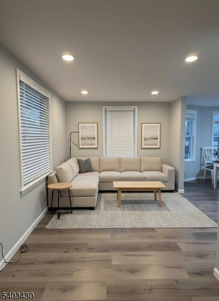 49 Blaine Street Millburn, NJ 07041 - Photo 2 of 10 a living room with furniture and a couch