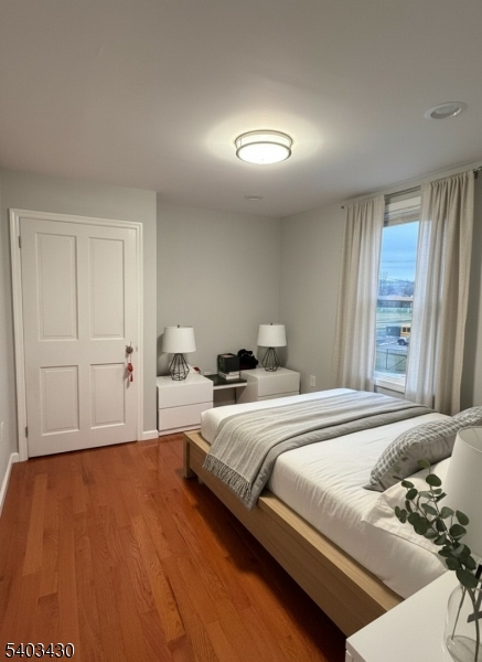 49 Blaine Street Millburn, NJ 07041 - Photo 8 of 10 a bedroom with bed and window
