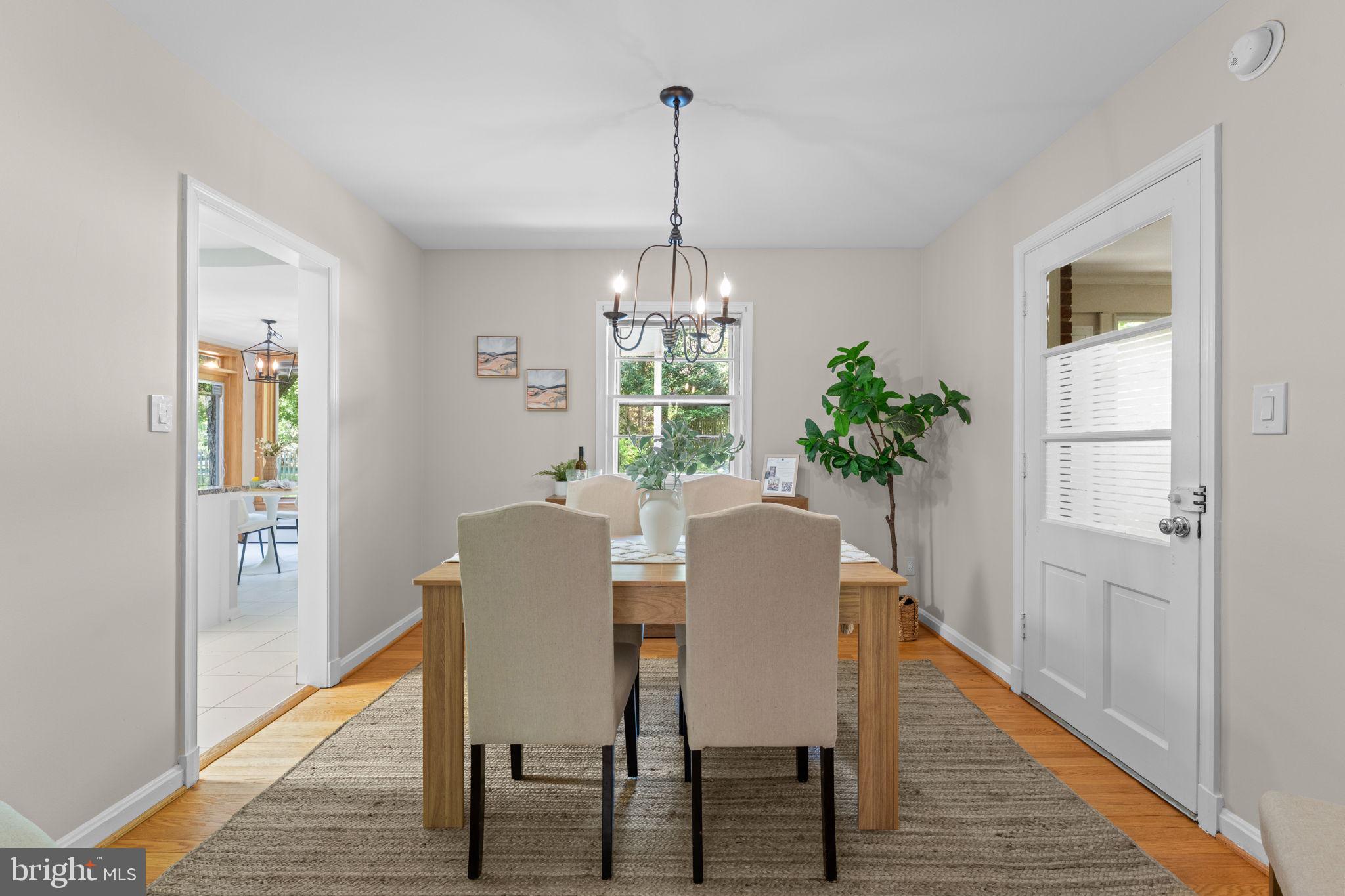 11712 Berwick Road Silver Spring, MD 20904 - Photo 6 of 42 a view of a dining room with furniture window and wooden floor