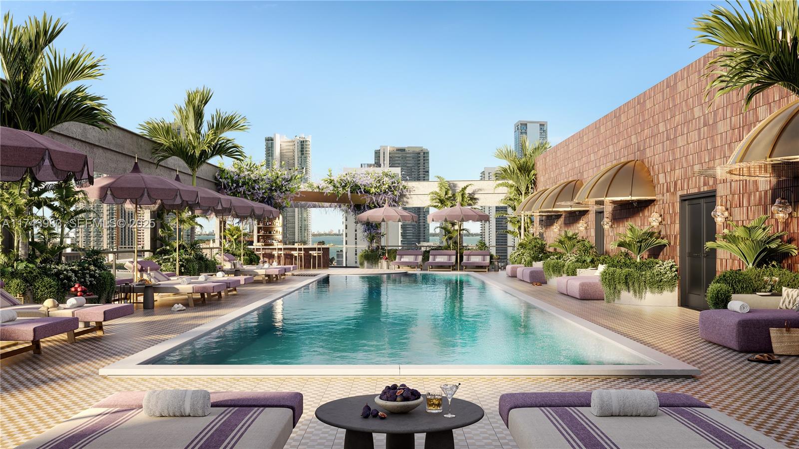 94 Northeast 29th Street, Unit 502 Miami, FL 33137 - Photo 22 of 29 a view of a swimming pool with outdoor seating