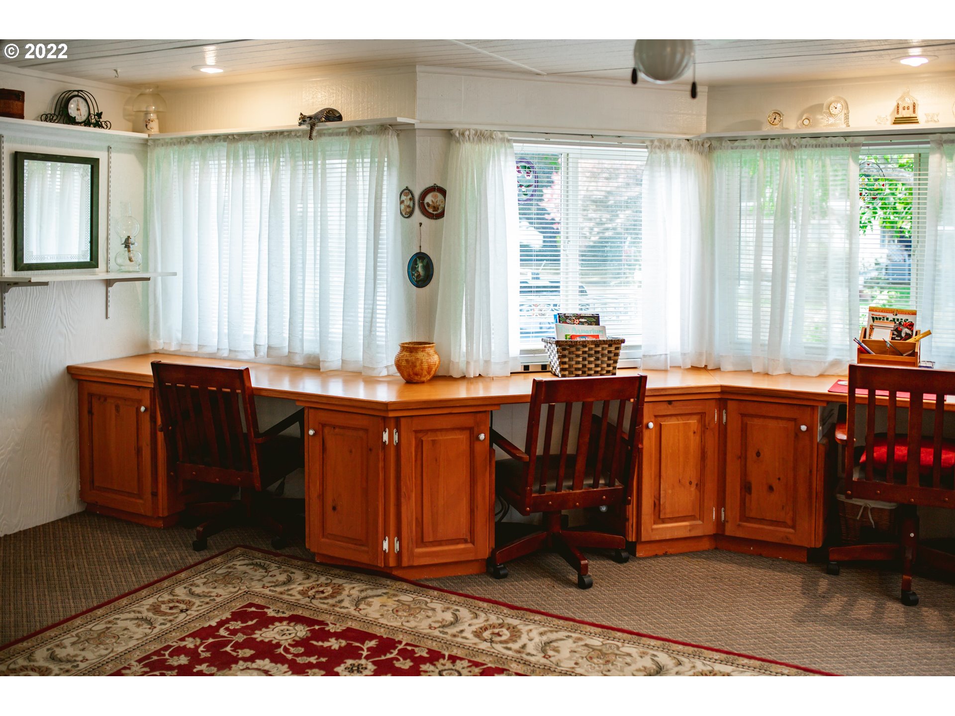 1625 Henderson Avenue, Unit E2 Eugene, OR 97403 - Photo 3 of 26 a living room with furniture and large windows