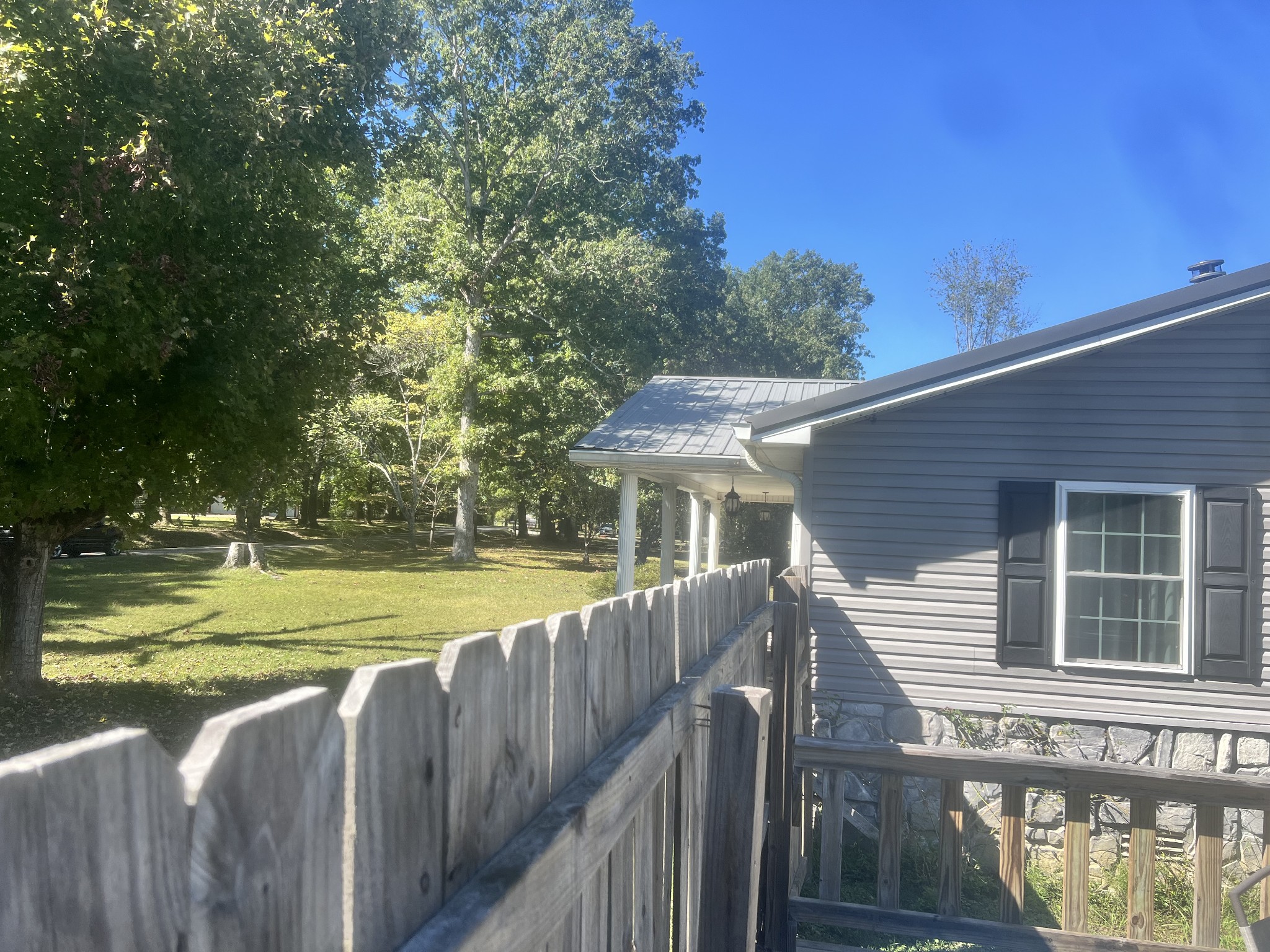 8376 Chestnut Ridge Road Lynchburg, TN 37352 - Photo 6 of 37 a view of a house with a yard and sitting area