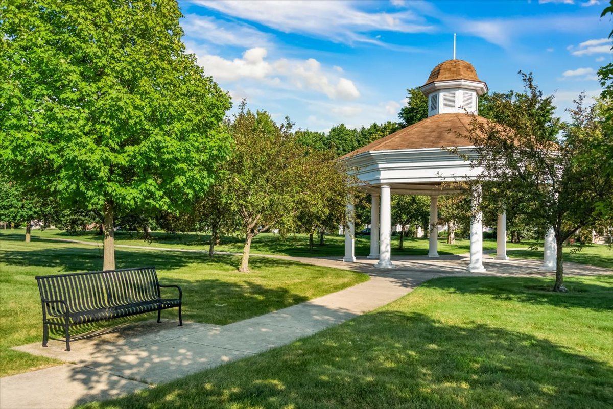 89 Hedgerow Drive Elgin, IL 60124 - Photo 47 of 51 a view of a house with a yard