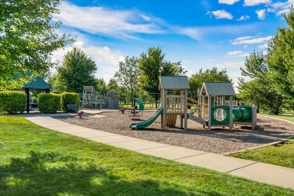 89 Hedgerow Drive Elgin, IL 60124 - Photo 49 of 51 a view of a park with swings and slides