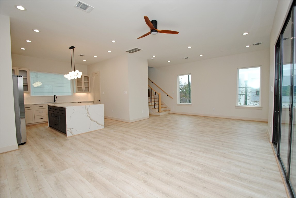 6310 Illinois Street, Unit A Houston, TX 77021 - Photo 9 of 22 a view of a kitchen with marble kitchen and stainless steel appliances