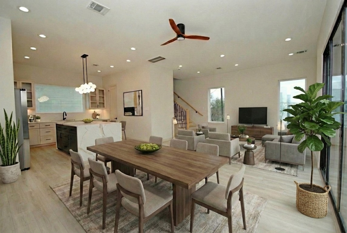 6310 Illinois Street, Unit A Houston, TX 77021 - Photo 10 of 22 a dining room with furniture and potted plants
