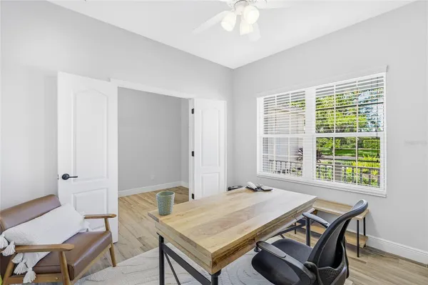 a room with a table and chairs