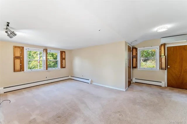 an empty room with windows