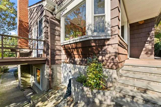 a view of entrance gate of building and stairs