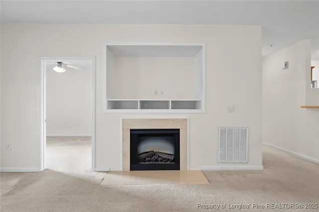 a view of a livingroom with a fireplace