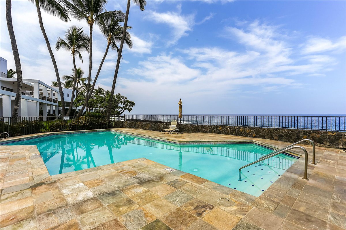 75-6040 Alii Drive, Unit 303 Kailua-Kona, HI 96740 - Photo 23 of 24 a view of a swimming pool