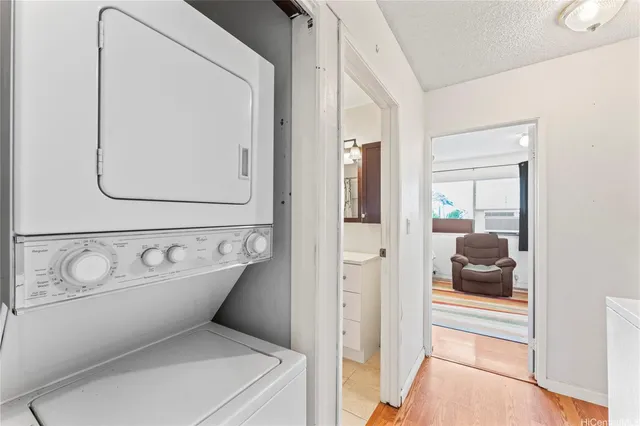 a bathroom with a toilet a sink and tub