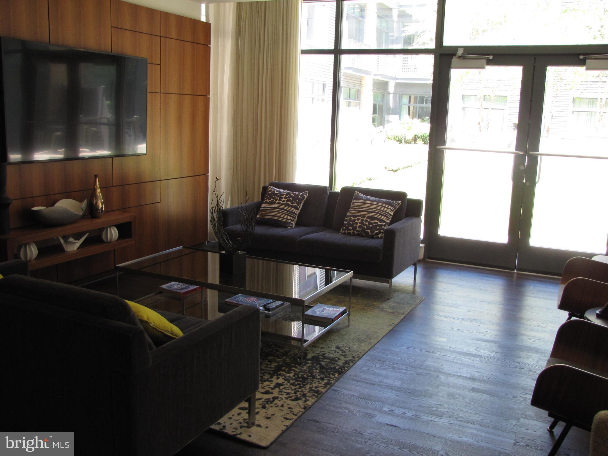 525 Water Street Southwest, Unit 404 Washington, DC 20024 - Photo 26 of 31 Club Room opens onto the courtyard.