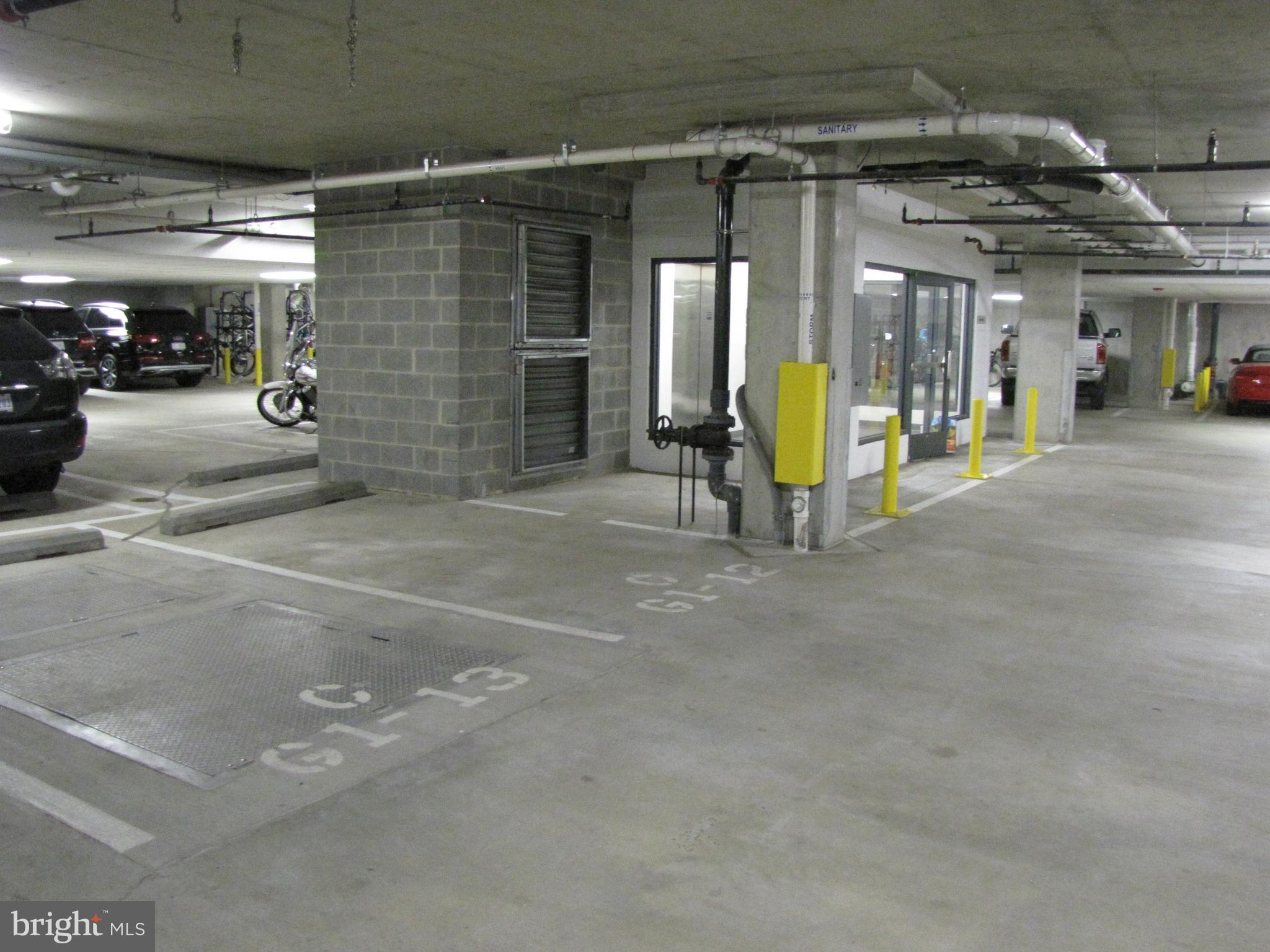 525 Water Street Southwest, Unit 404 Washington, DC 20024 - Photo 30 of 31 Garage parking spot adjacent to elevator.