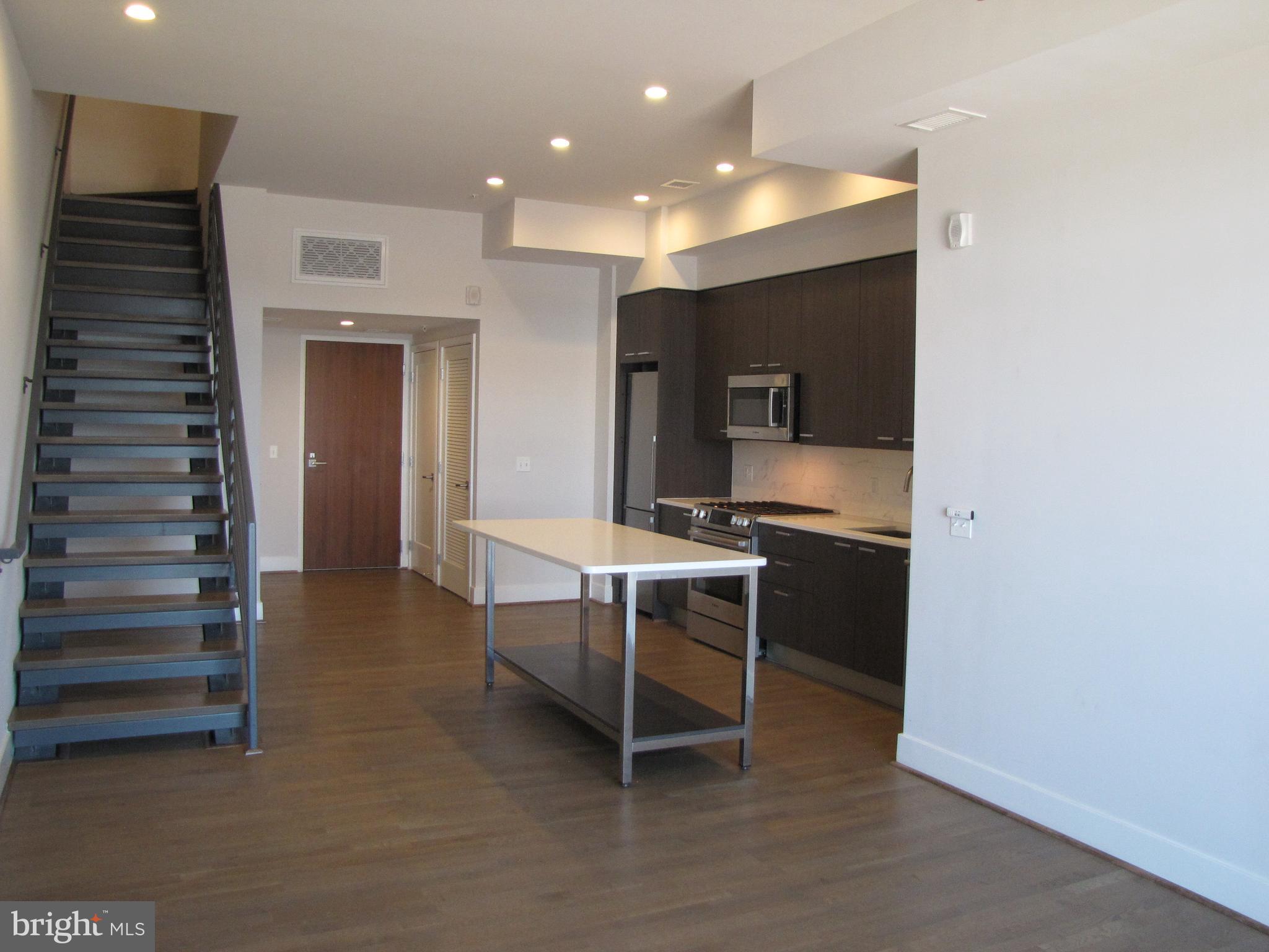 525 Water Street Southwest, Unit 404 Washington, DC 20024 - Photo 5 of 31 Quartz island is beautiful focal point.