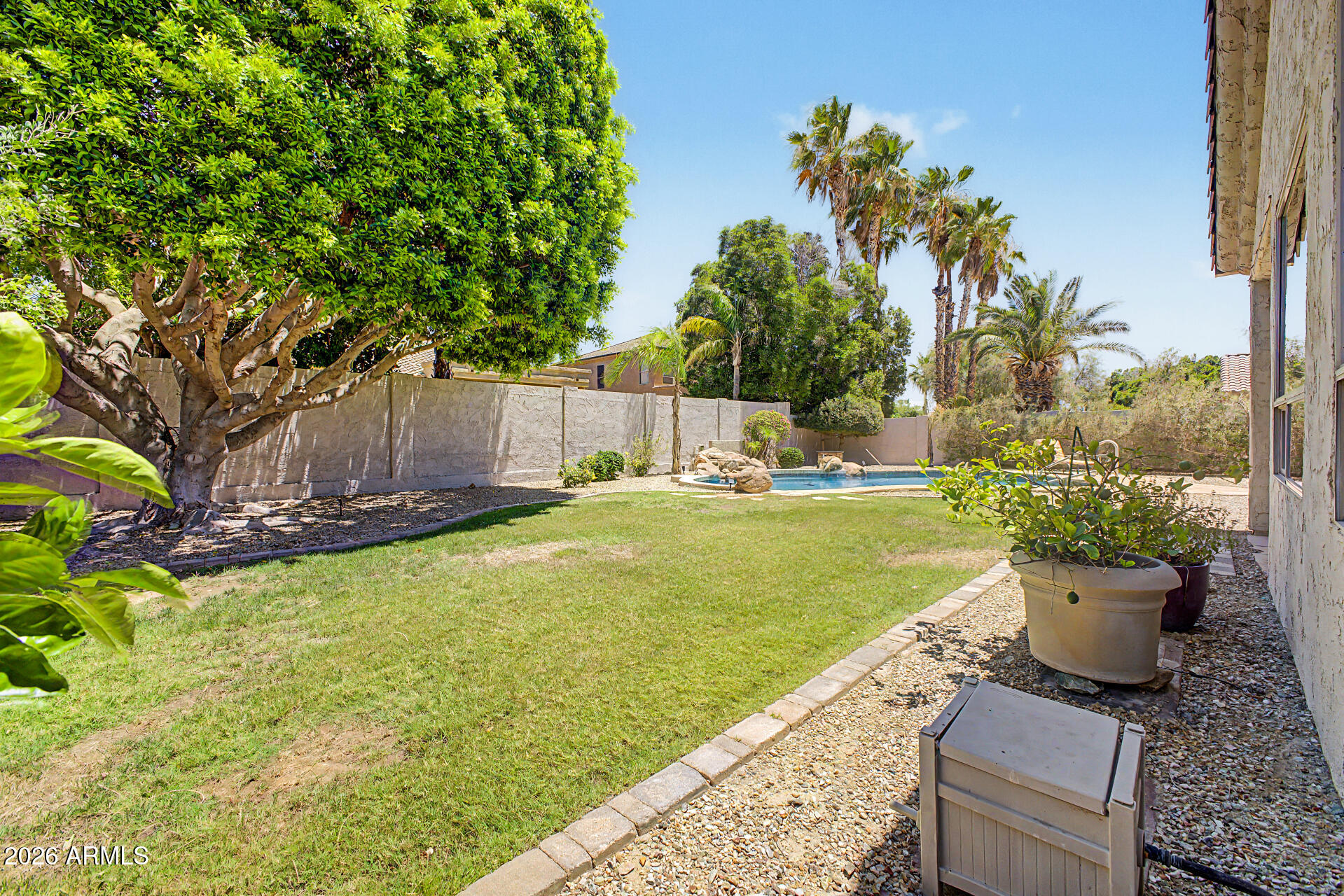 1632 West Frye Road Phoenix, AZ 85045 - Photo 30 of 37 a view of a backyard with plants and patio
