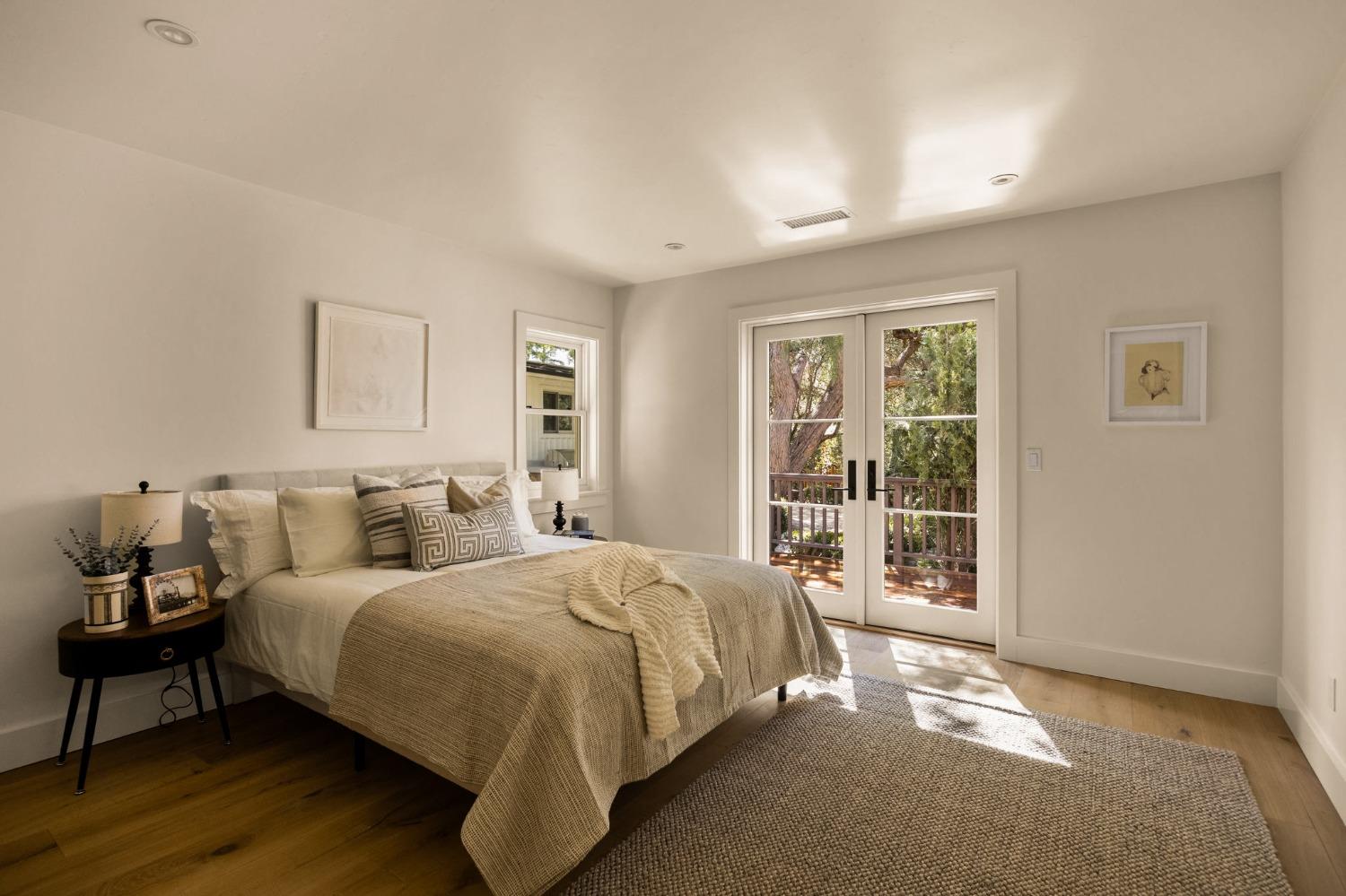 1221 Foothill Road Ojai, CA 93023 - Photo 19 of 42 a bedroom with a bed and a window