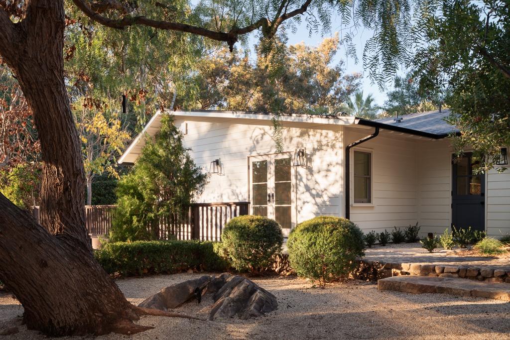 1221 Foothill Road Ojai, CA 93023 - Photo 24 of 42 a front view of a house with garden