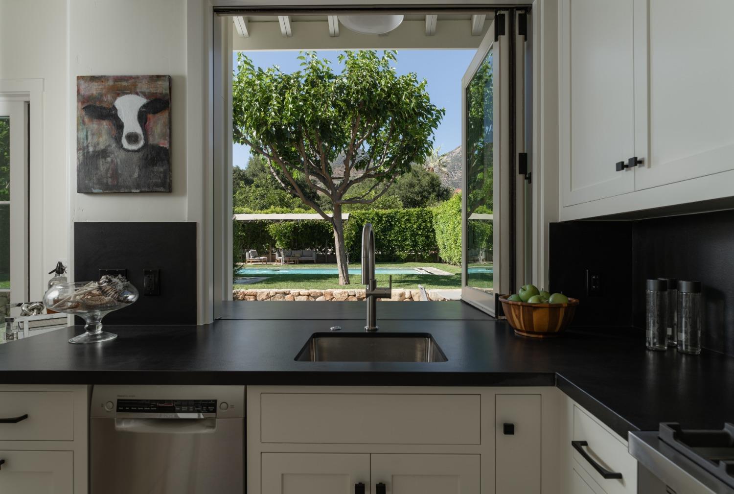 1221 Foothill Road Ojai, CA 93023 - Photo 34 of 42 a kitchen with a sink and large window