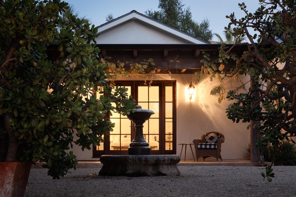 1221 Foothill Road Ojai, CA 93023 - Photo 42 of 42 a front view of a house with a yard