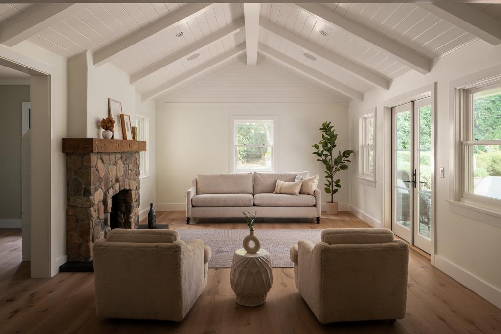 1221 Foothill Road Ojai, CA 93023 - Photo 10 of 42 a living room with furniture and a fireplace